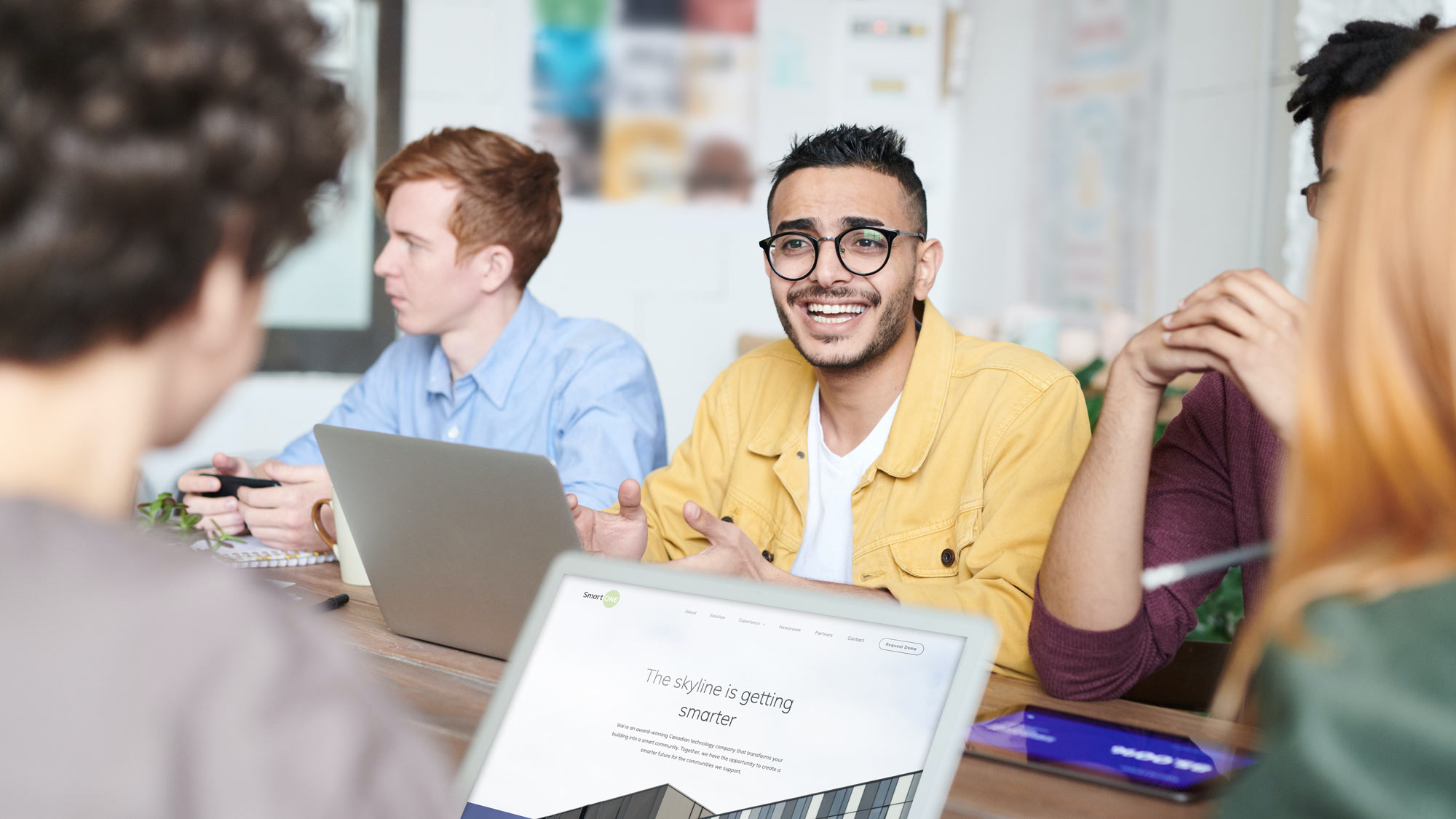 Dynamic group of young professionals collaborating in a meeting